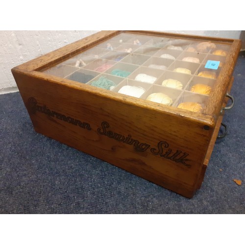 40 - A mid 20th Century Gutermann Sewing silk oak tabletop shop display case having 2 drawers with glass ... 