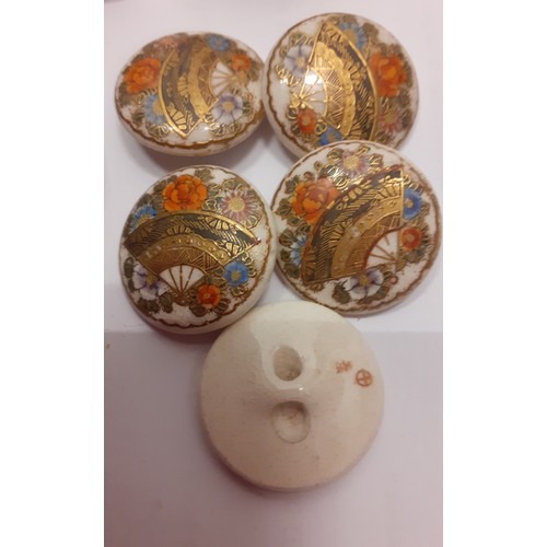 41 - A quantity of buttons to include 5 Satsuma buttons having a 2 character mark to the reverse and earl... 