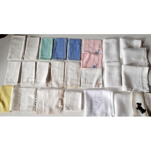 48 - Thirteen Edwardian white cotton Broderie Anglais ladies collars on card, 2 cream silk machine made l... 