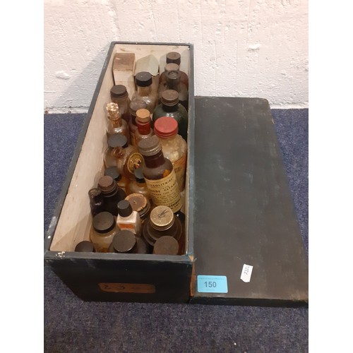 150 - A quantity of vintage glass household bottles containing suede cleaner, straw hat dye and smelling s... 