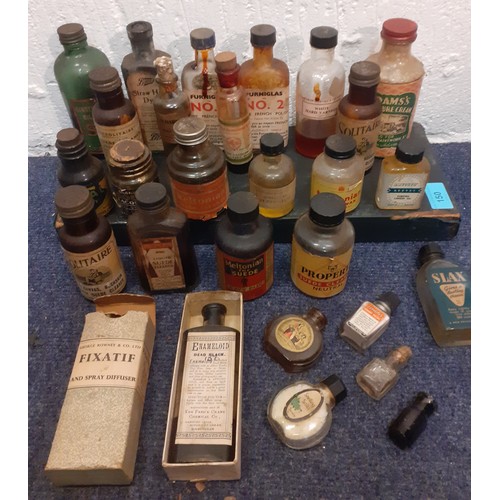 150 - A quantity of vintage glass household bottles containing suede cleaner, straw hat dye and smelling s... 