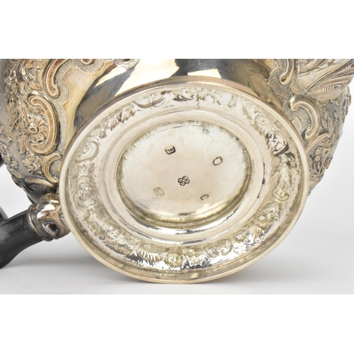 10 - A George III silver teapot, by Rebecca Emes & Edward Barnard I, hallmarked London 1819, having an eb... 