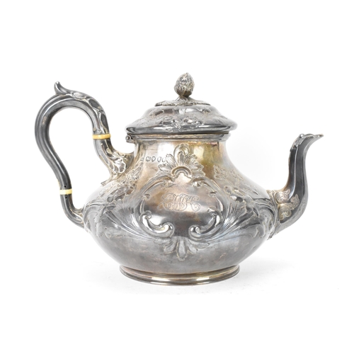 100 - A Victorian silver teapot by Goldsmiths Alliance Ltd, hallmarked London 1878, having an acorn finial... 