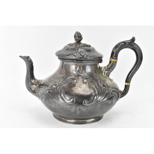 100 - A Victorian silver teapot by Goldsmiths Alliance Ltd, hallmarked London 1878, having an acorn finial... 