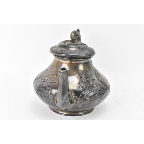 100 - A Victorian silver teapot by Goldsmiths Alliance Ltd, hallmarked London 1878, having an acorn finial... 