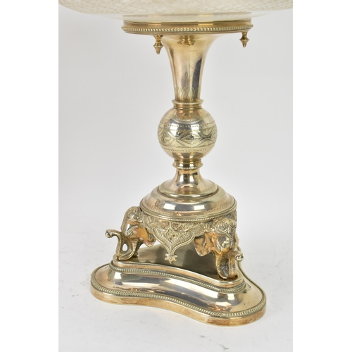 103 - A pair of late Victorian silver plated pedestal dishes, each having cut glass dishes raised by a kno... 