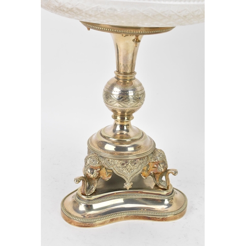 103 - A pair of late Victorian silver plated pedestal dishes, each having cut glass dishes raised by a kno... 