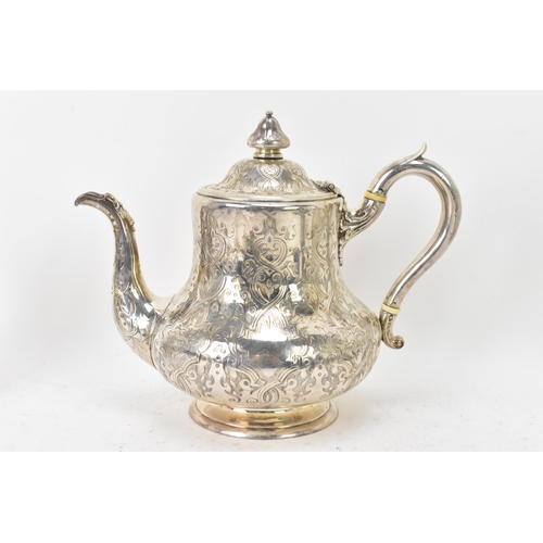 112 - A Victorian silver teapot and matching cream jug by Robert Hennell III, hallmarked London 1855, each... 