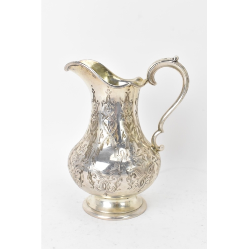 112 - A Victorian silver teapot and matching cream jug by Robert Hennell III, hallmarked London 1855, each... 