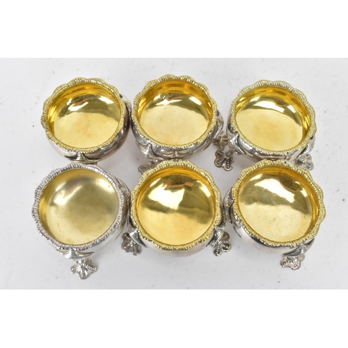 113 - A George III set of six silver salts by David Hennell I, hallmarked London 1762, each having gadroon... 