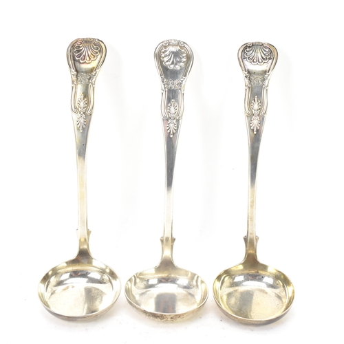 115 - A Victorian silver set of three silver sauce ladles by Robert Livingstone Christie, hallmarks for Ed... 