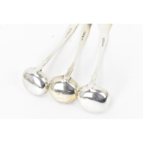 115 - A Victorian silver set of three silver sauce ladles by Robert Livingstone Christie, hallmarks for Ed... 