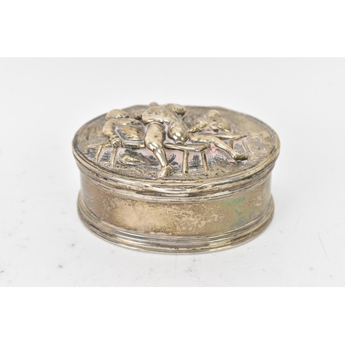 120 - A George IV silver snuff box by Edward Farrell, hallmarked London 1821, of oval form, the hinged lid... 