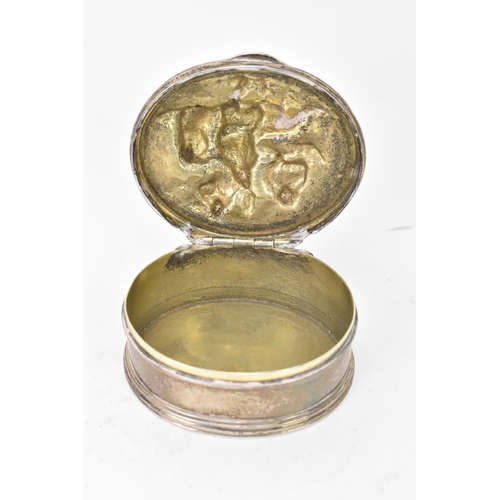 120 - A George IV silver snuff box by Edward Farrell, hallmarked London 1821, of oval form, the hinged lid... 