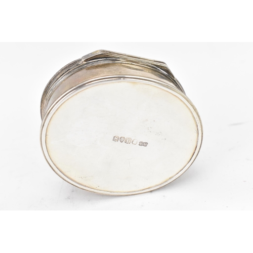 120 - A George IV silver snuff box by Edward Farrell, hallmarked London 1821, of oval form, the hinged lid... 