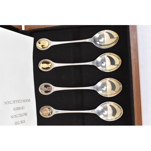 123 - An Elizabeth II silver cased set of The Royal Society For The Protection Of Birds Spoon Collection, ... 