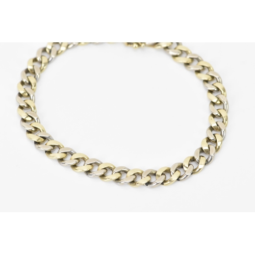 124 - A 9ct gold bi-coloured curb link bracelet, hallmarked 375 to the clasp, 20.5cm, 21.9 grams