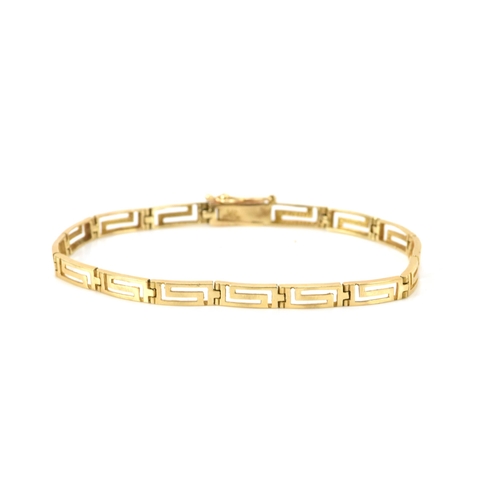 126 - A 14ct gold bracelet having Grecian key design links, stamped 585 to the clasp, 18cm, 6.4 grams