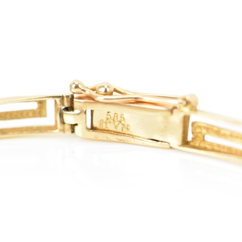 126 - A 14ct gold bracelet having Grecian key design links, stamped 585 to the clasp, 18cm, 6.4 grams