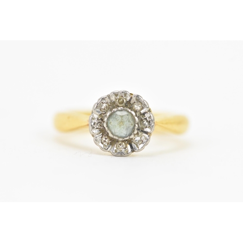 127 - A 22ct yellow gold, diamond and topaz cluster dress ring, set with a central faceted cut topaz surro... 