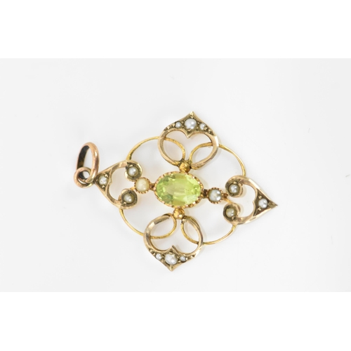 128 - Two Edwardian pendants to include a 9ct yellow gold peridot and seed pearl pendant, 32mm x 25mm, 1.7... 