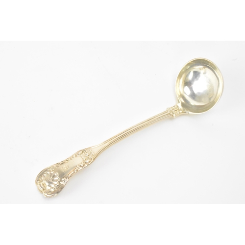 13 - A Victorian silver serving spoon hallmarked London 1892, together with a silver ladle hallmarked Gla... 