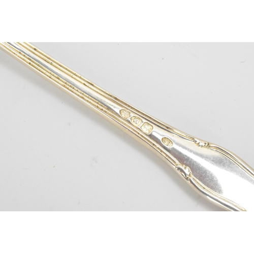 13 - A Victorian silver serving spoon hallmarked London 1892, together with a silver ladle hallmarked Gla... 