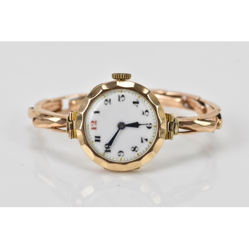 130 - An early 20th century 9ct yellow gold ladies manual wind wristwatch, on a 9ct gold expanding bracele... 