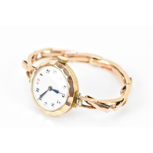 130 - An early 20th century 9ct yellow gold ladies manual wind wristwatch, on a 9ct gold expanding bracele... 