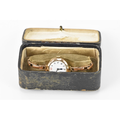 130 - An early 20th century 9ct yellow gold ladies manual wind wristwatch, on a 9ct gold expanding bracele... 