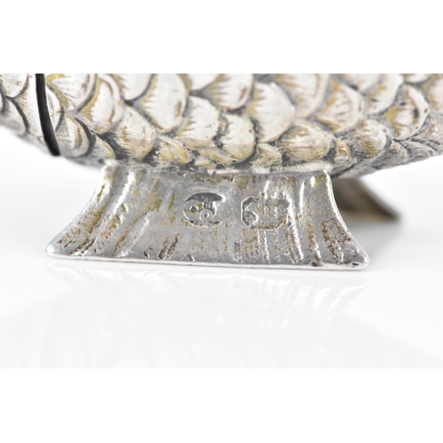 136 - A late Victorian silver novelty lady's sewing etui, fashioned as an articulated fish, the hinged hea... 