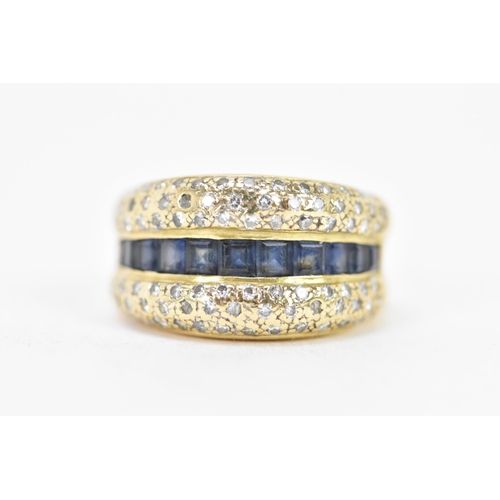 139 - A 14ct white gold sapphire and diamond dress ring, the centre inset with a row of eleven square bagu... 