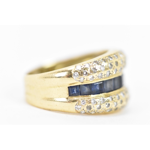 139 - A 14ct white gold sapphire and diamond dress ring, the centre inset with a row of eleven square bagu... 