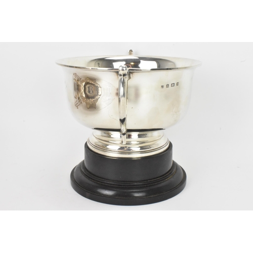 2 - A George V silver twin handled presentation bowl, Birmingham 1925, having a flared rim, engraved to ... 