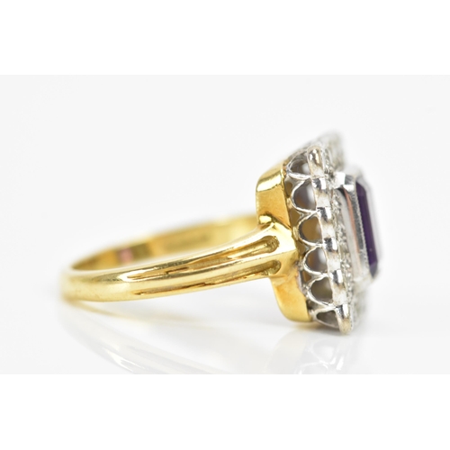 242 - An 18ct yellow gold amethyst and diamond cluster ring, the central baguette cut amethyst surface mea... 