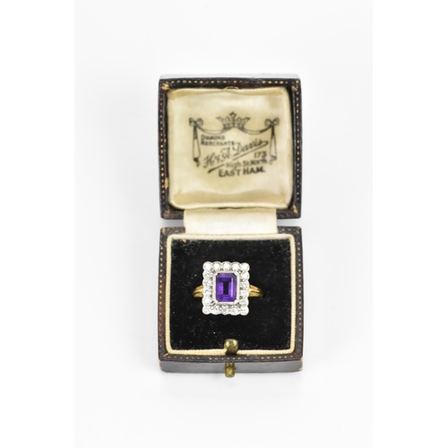 242 - An 18ct yellow gold amethyst and diamond cluster ring, the central baguette cut amethyst surface mea... 