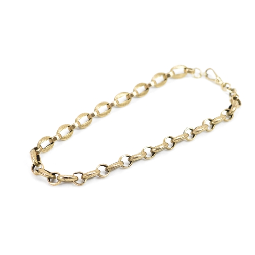 245 - A 9ct gold late 19th/early 20th century chain link  belcher necklace, the oval links engraved with a... 