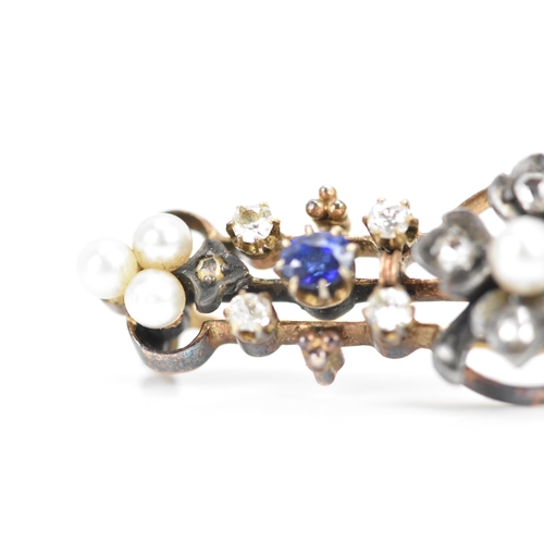 256 - A Victorian yellow metal diamond, sapphire and pearl brooch, the centre fashioned as a four-leaf clo... 