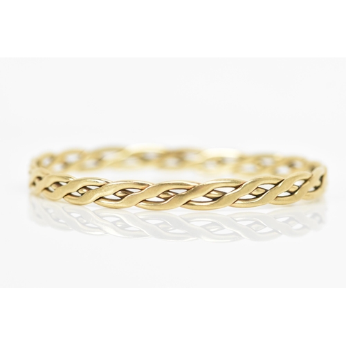 261 - A 9ct yellow gold bangle, of woven design, stamped 375, approx 22cm outer circumference, 18.9 grams