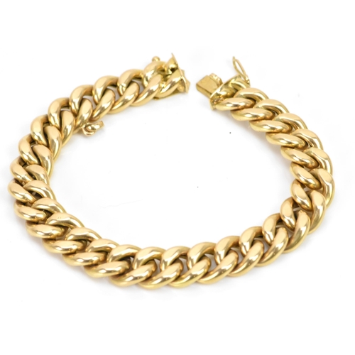 268 - A Yelloe gold curb chain link bracelet, tested as 14ct, with an open box clasp, 19cm, 22.4 grams