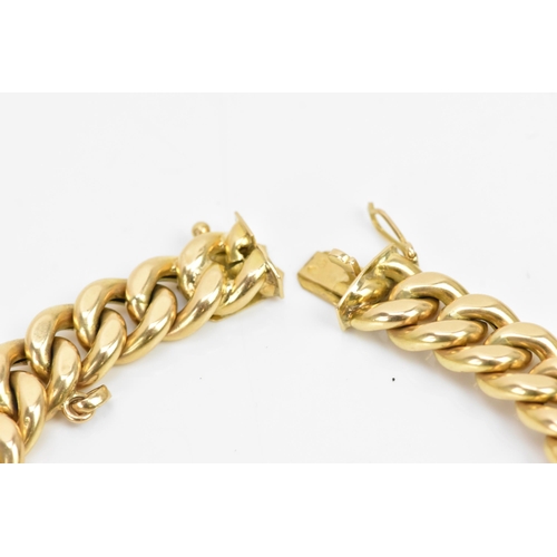 268 - A Yelloe gold curb chain link bracelet, tested as 14ct, with an open box clasp, 19cm, 22.4 grams