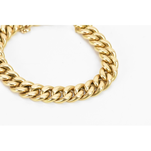 268 - A Yelloe gold curb chain link bracelet, tested as 14ct, with an open box clasp, 19cm, 22.4 grams