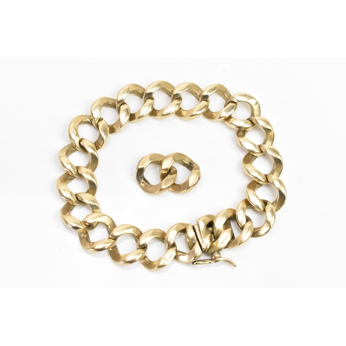 271 - A 9ct gold curb link bracelet, having an open box clasp, stamped 375, with two spare links, 22cm exc... 