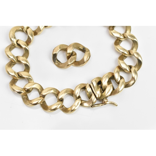 271 - A 9ct gold curb link bracelet, having an open box clasp, stamped 375, with two spare links, 22cm exc... 