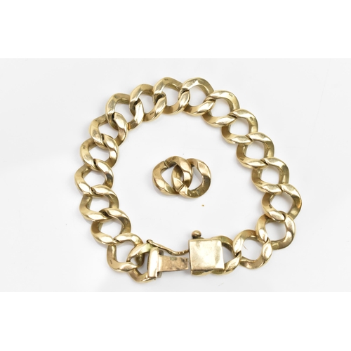 271 - A 9ct gold curb link bracelet, having an open box clasp, stamped 375, with two spare links, 22cm exc... 