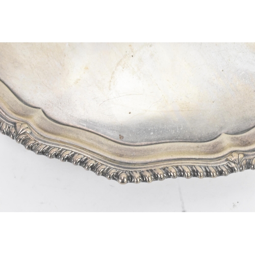 275 - A George VI silver tray, by Barker Brothers Silver Ltd, hallmarked Birmingham 1937, having a shaped ... 