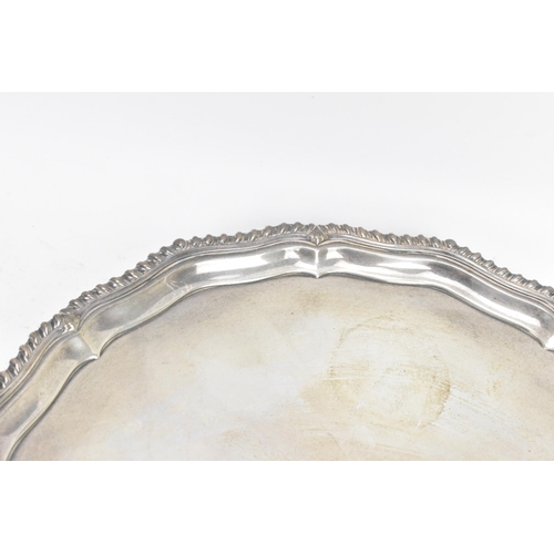 275 - A George VI silver tray, by Barker Brothers Silver Ltd, hallmarked Birmingham 1937, having a shaped ... 