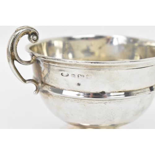 279 - A George V silver christening cup, makers marks rubbed, hallmarked Birmingham 1920, having a scroll ... 