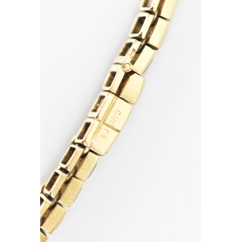 283 - A Cartier mid 20th century gold and Citrine line bracelet made into a watch strap and fitted to a la... 