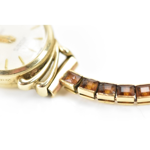 283 - A Cartier mid 20th century gold and Citrine line bracelet made into a watch strap and fitted to a la... 